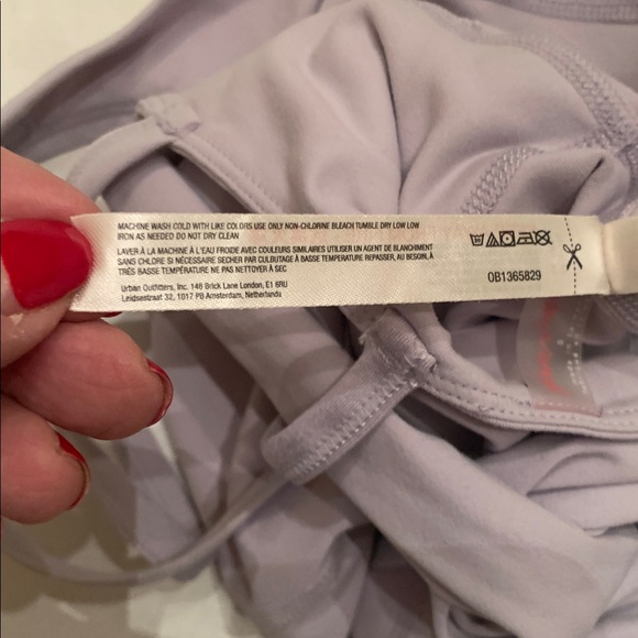 FP Movement by Free People Twist back Onesie size Small
mauve color - Picture 7 of 8